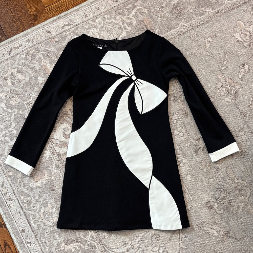 Biscotti Collection  
Chic Monochrome Kids Dress with Bow Accent